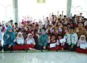 TP PKK-Baznas Kota Palembang Salurkan Bantuan Dana Buku untuk Siswa MI Darussalam