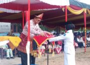 Upacara HUT Ke-81 RI di Kecamatan Teluk Gelam Berlangsung Khidmat, Nuansa Busana Adat Warnai Peringatan